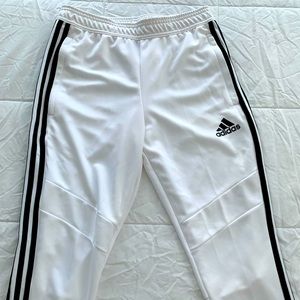 Adidas track pants.